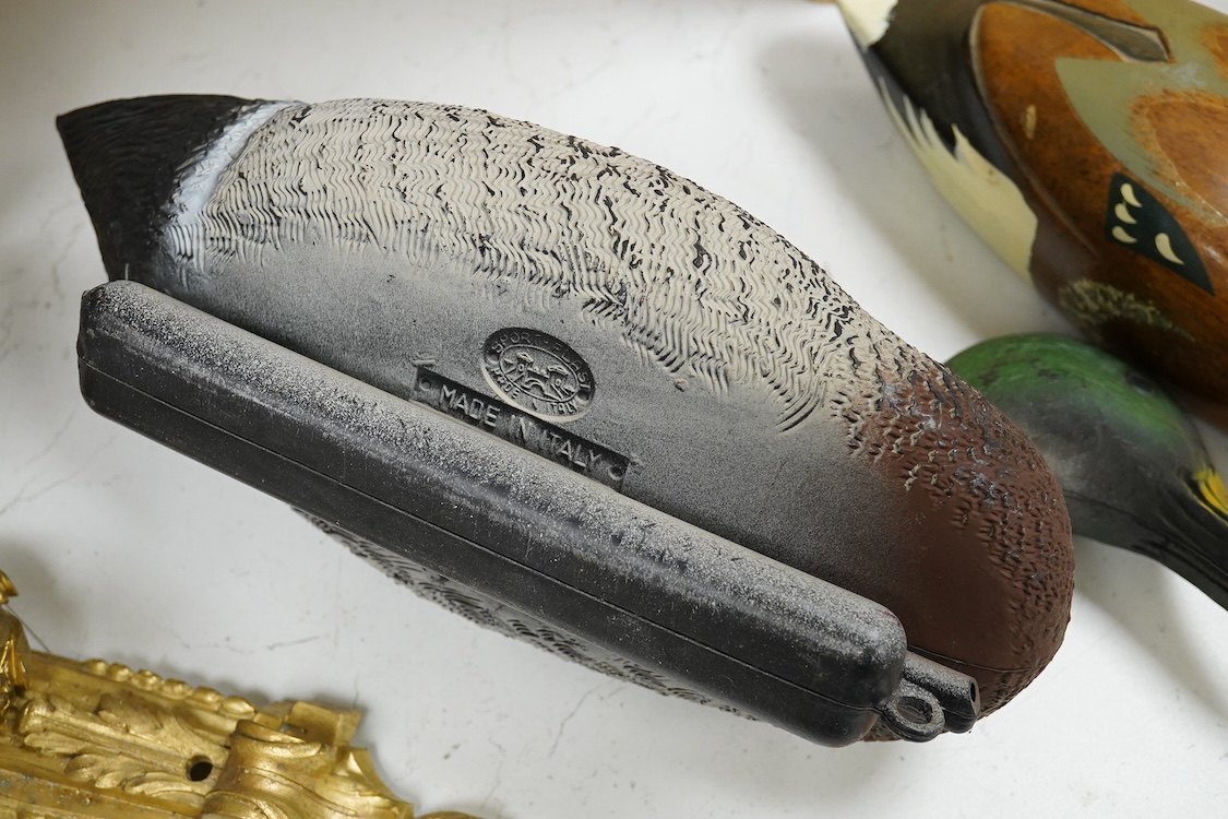 A decoy duck-42cm long, with a carved and painted wooden model of a duck. (2).